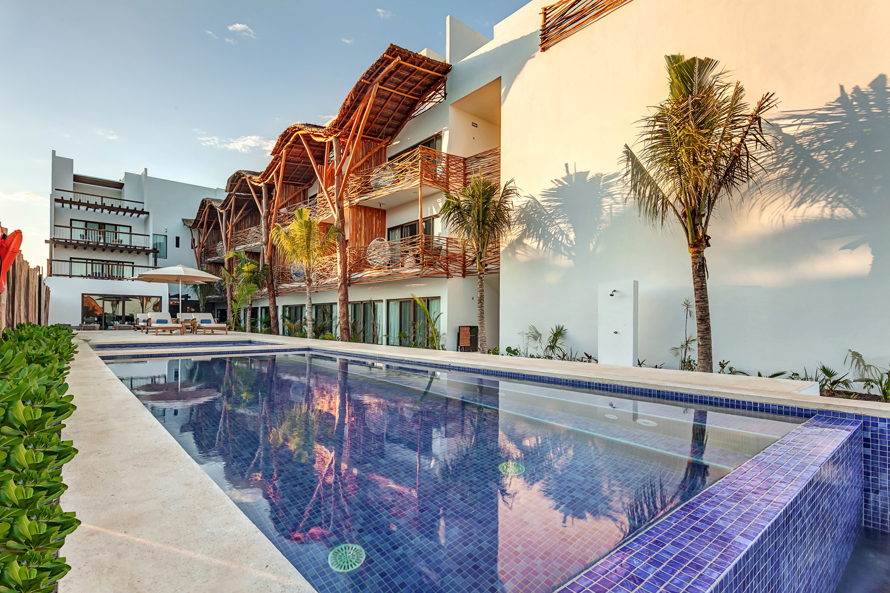 a pool in front of a building