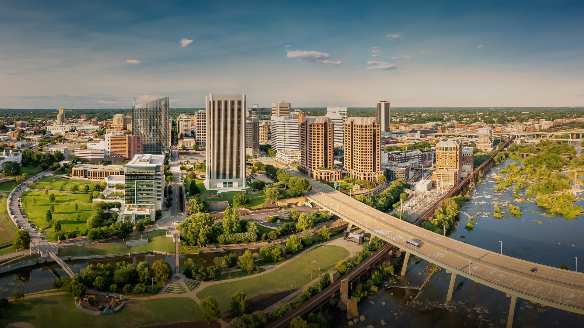 a city with a bridge over a river