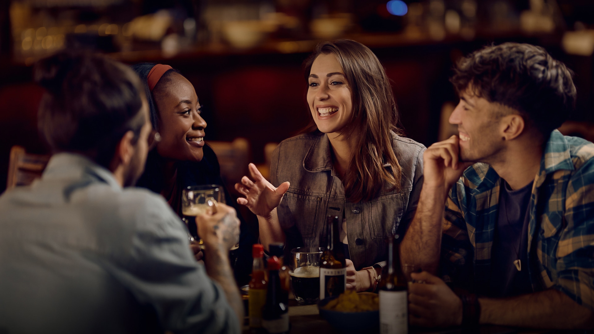 a group of people sitting around a table