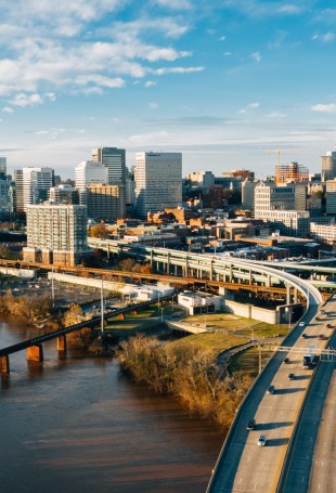 a city with a bridge over a river