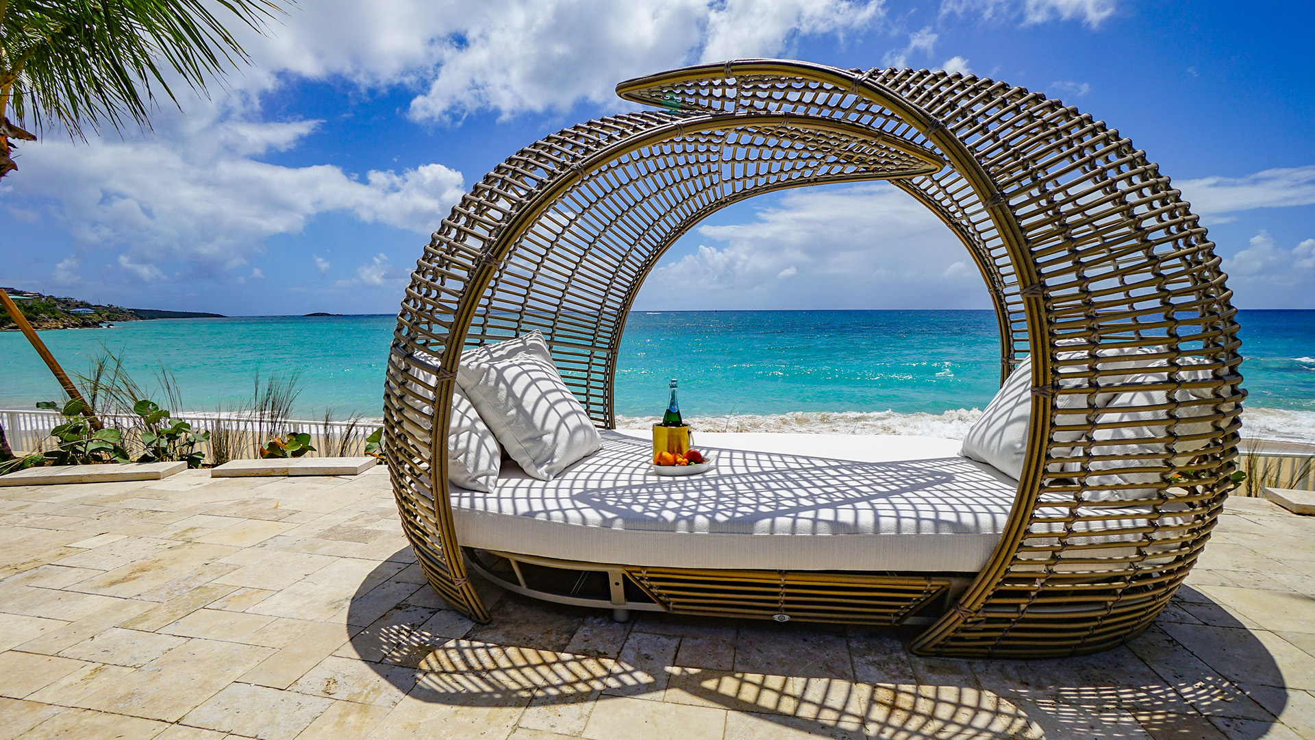 a lounge chair on a beach