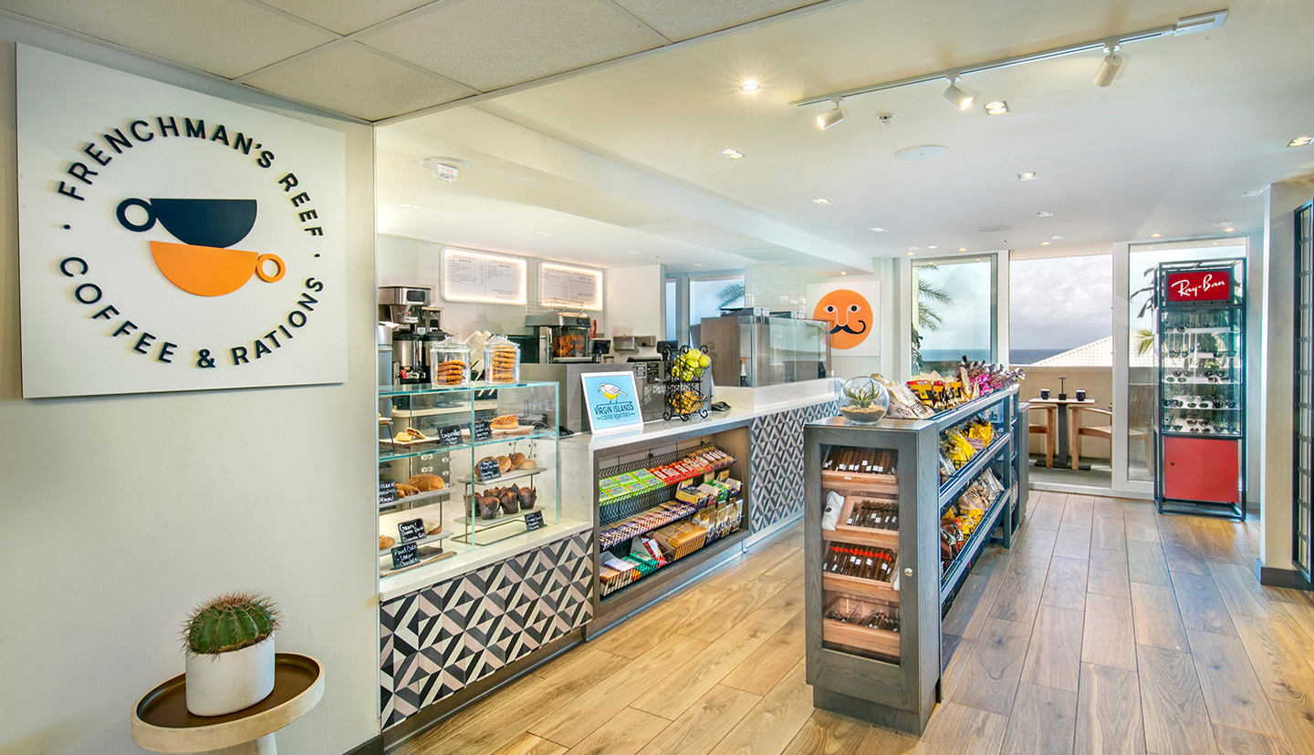 a bakery with shelves and food