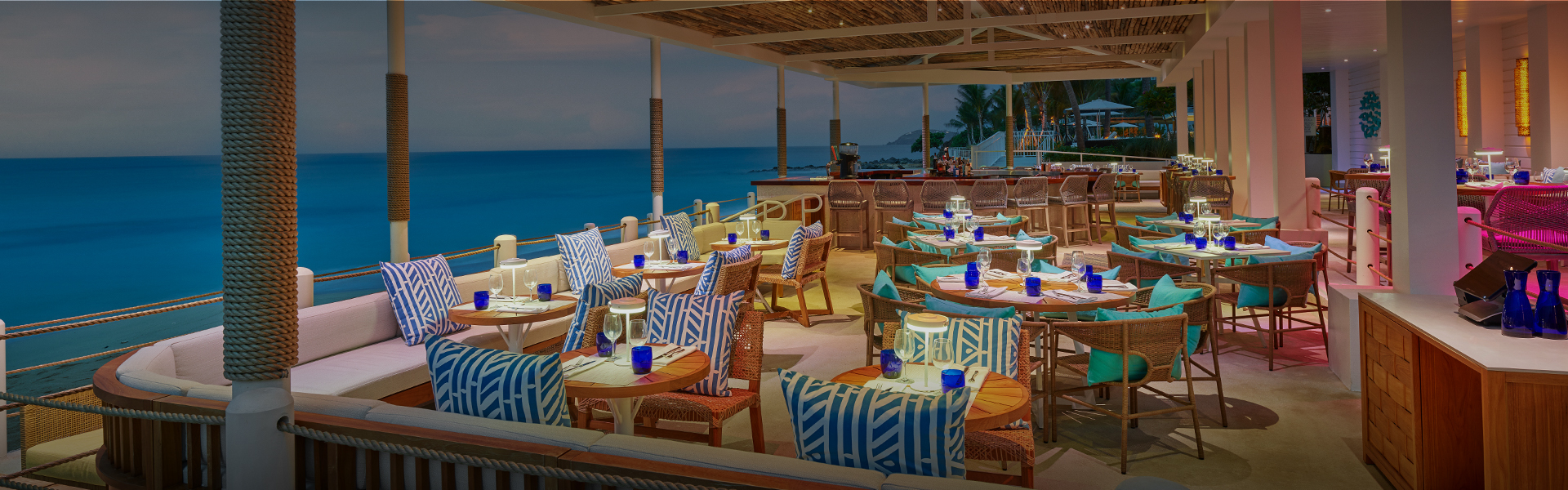 a restaurant with tables and chairs