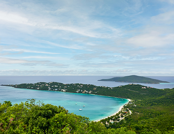 a body of water with houses and boats in it