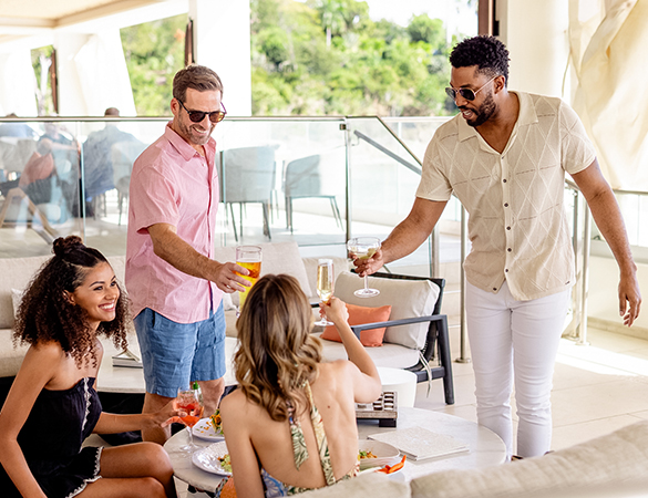 a group of people drinking and talking
