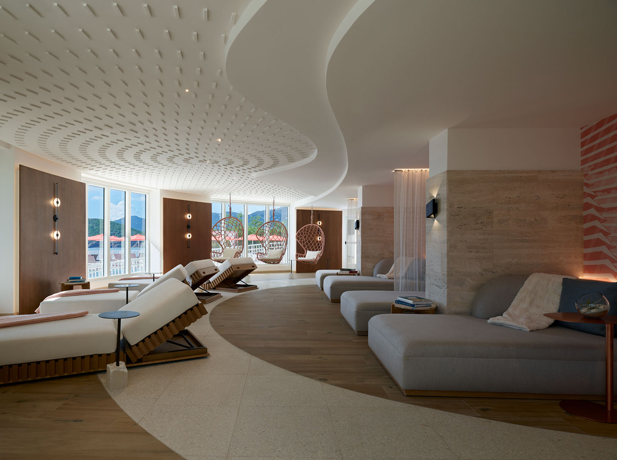 a room with couches and chairs