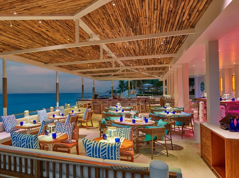 a restaurant with tables and chairs
