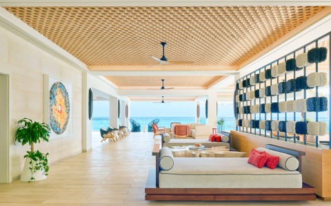 a room with couches and chairs