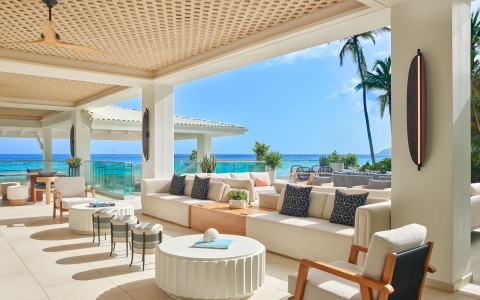 a large outdoor patio with a large table and chairs