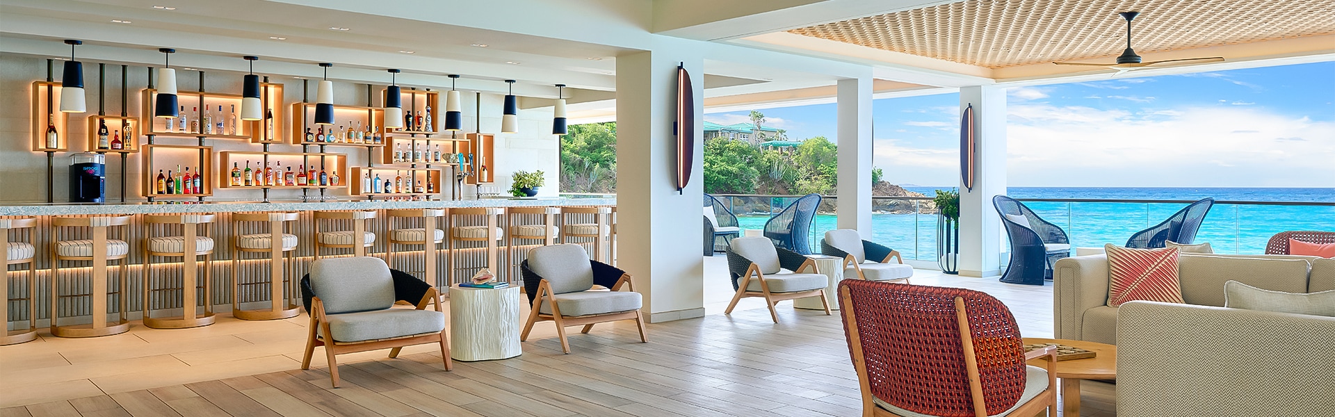 a room with chairs and a bar