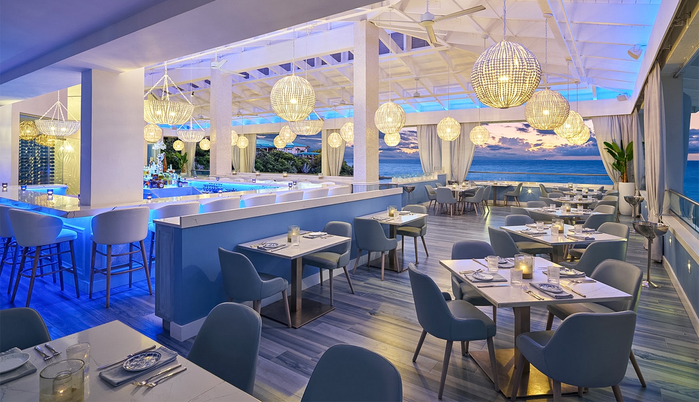 a restaurant with tables and chairs