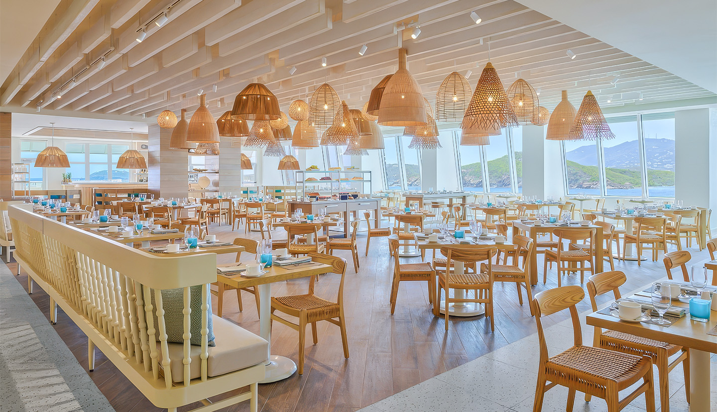 a restaurant with tables and chairs
