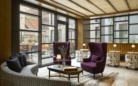 a room with chairs and tables