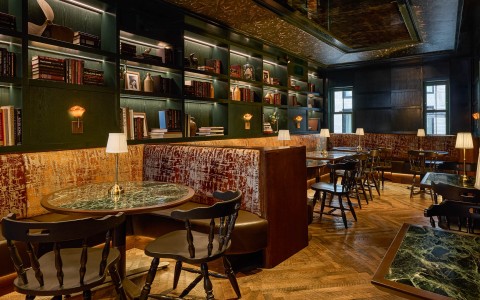 a room with a table and chairs