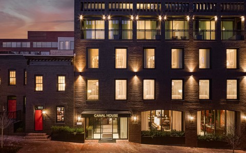 a building with many windows and lights