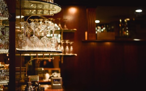 a rack of wine glasses