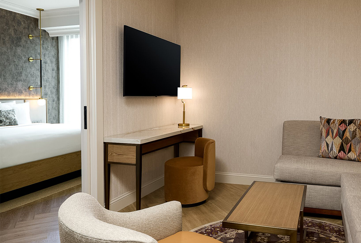 a room with a television on the wall