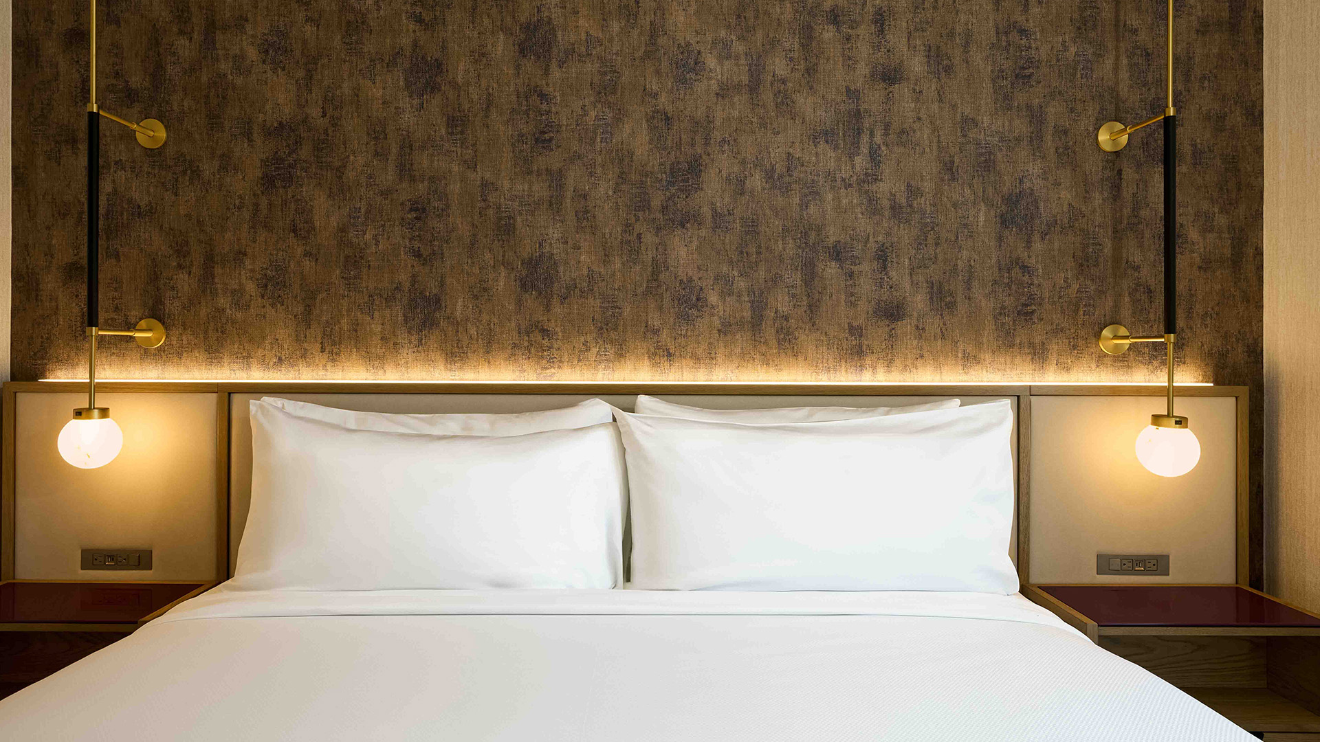 a bed with white pillows