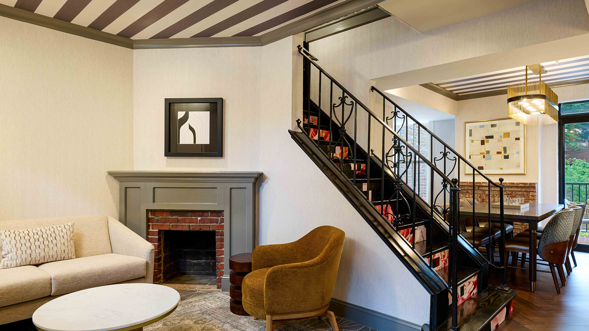 a room with a fireplace and a chair