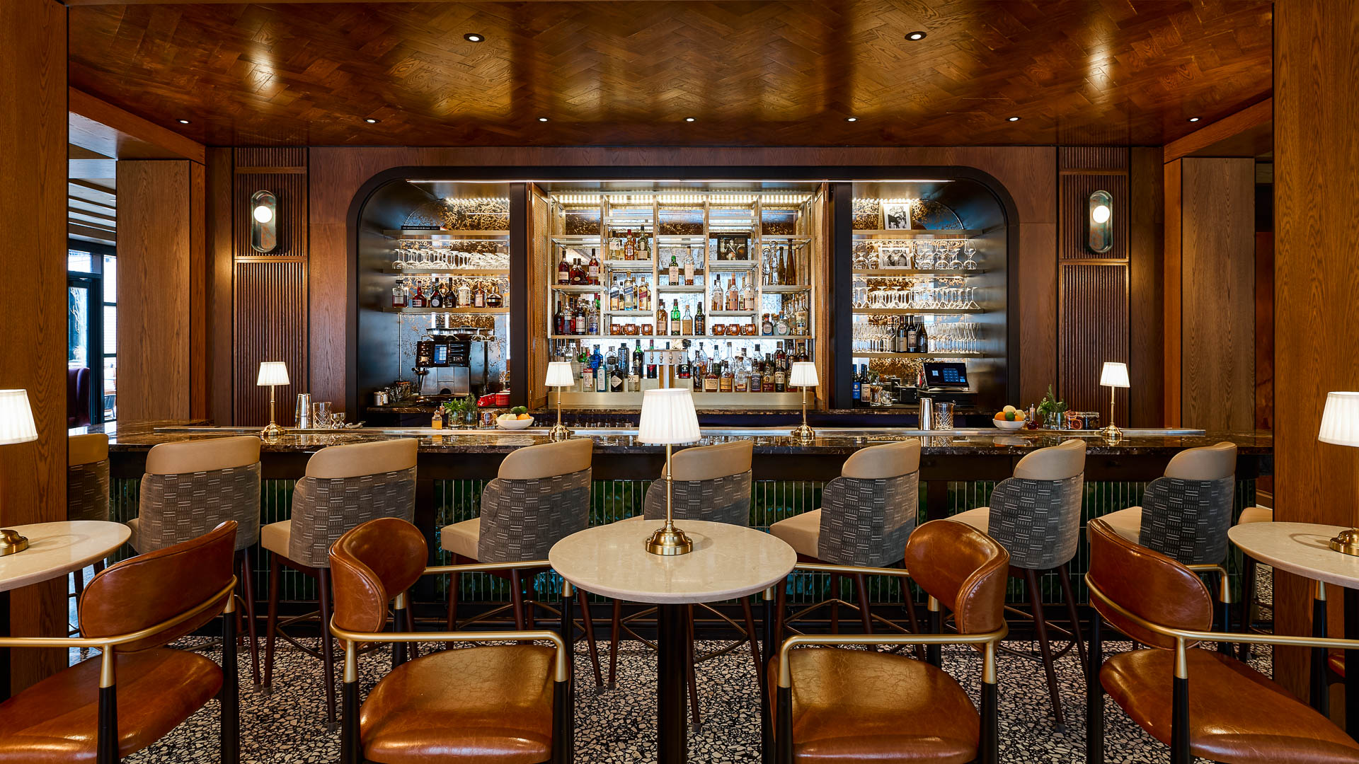 a bar with a table and chairs