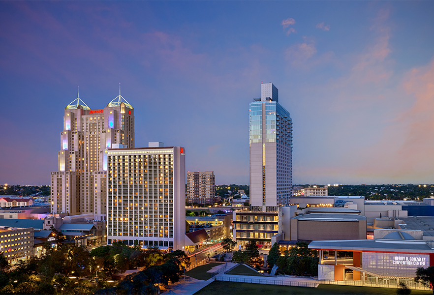 a city skyline with many tall buildings