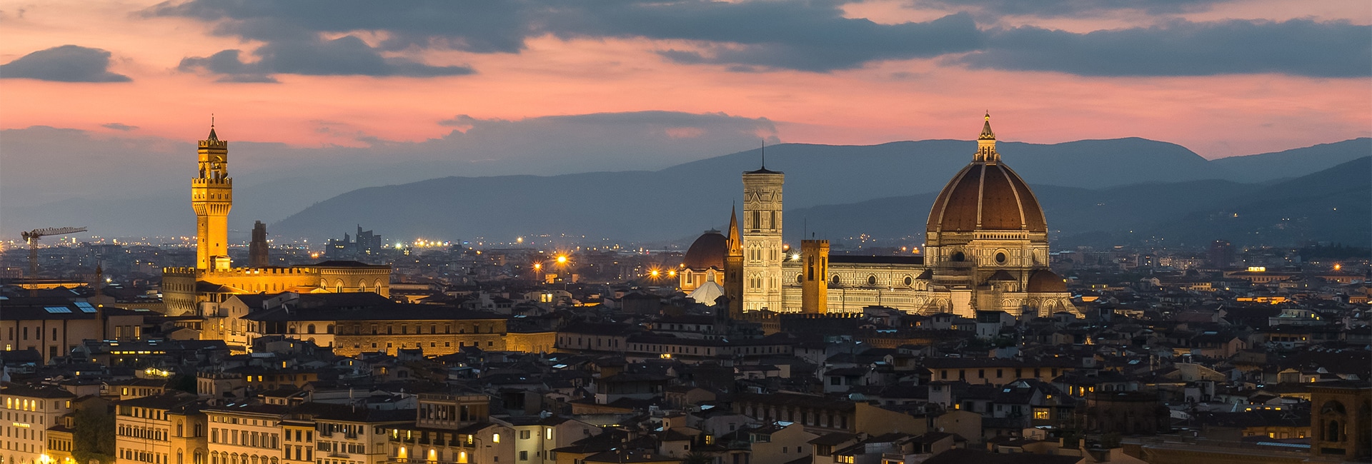 a city with a large building and a dome