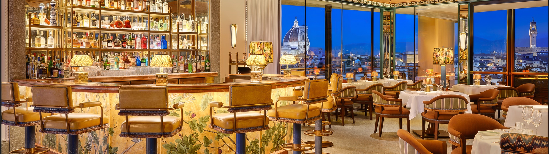 a bar with chairs and a table