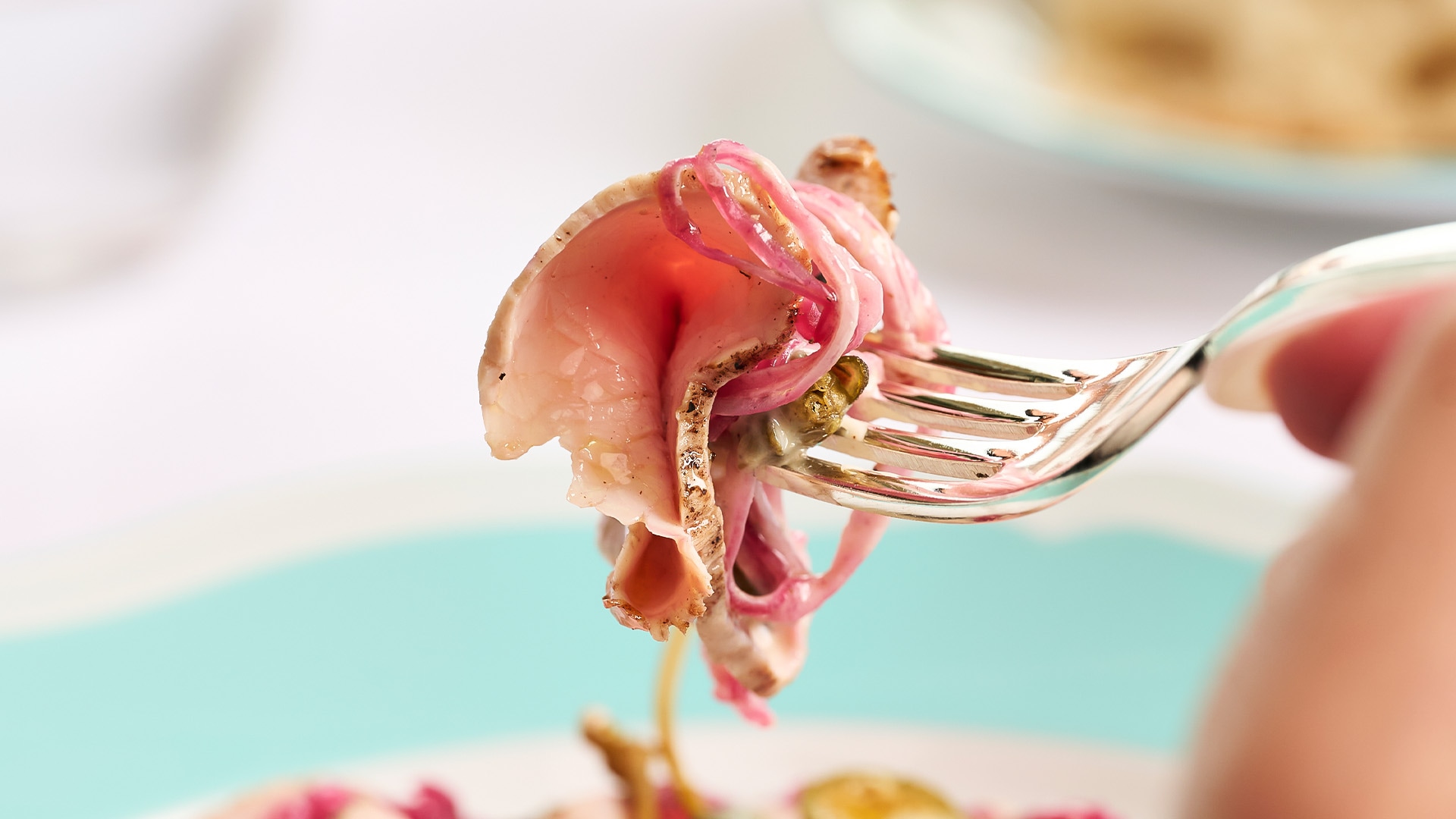 a fork with food on it