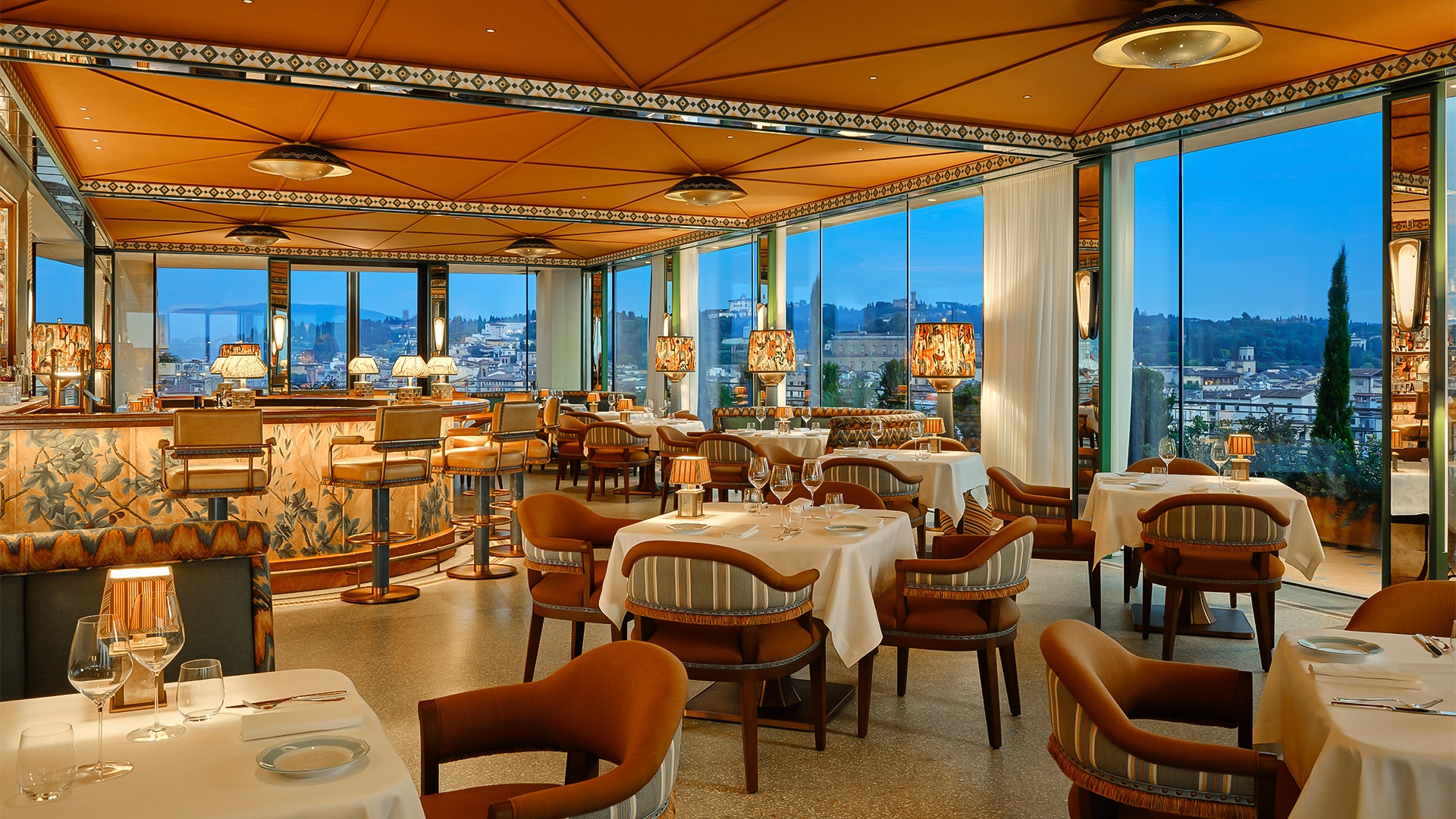 a restaurant with tables and chairs