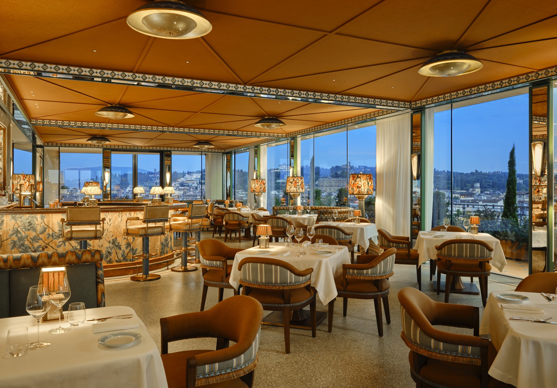 a restaurant with tables and chairs