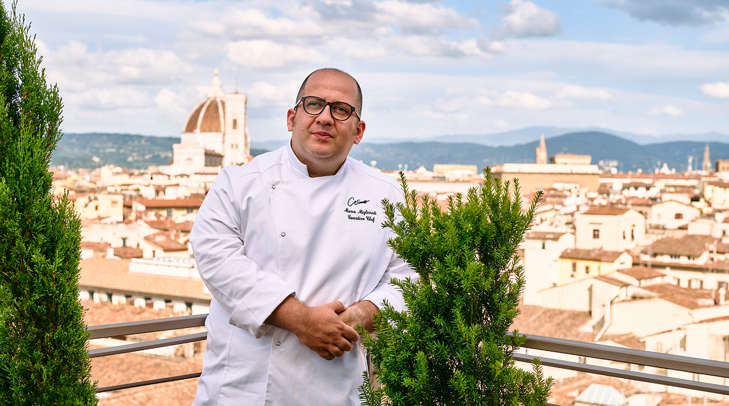 a man in a white coat
