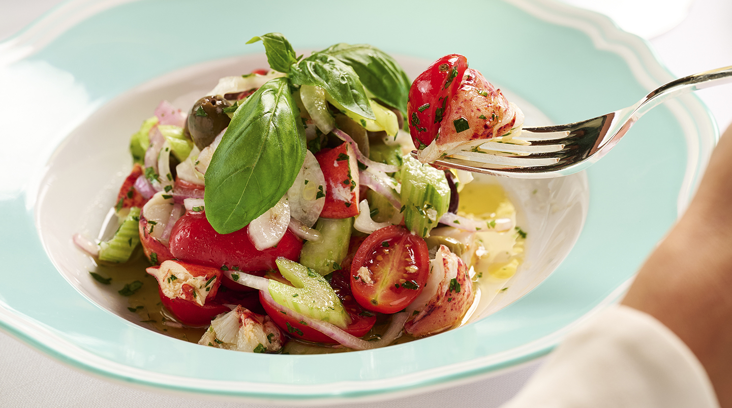 a fork in a bowl of salad