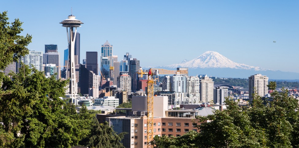 a city with a mountain in the background