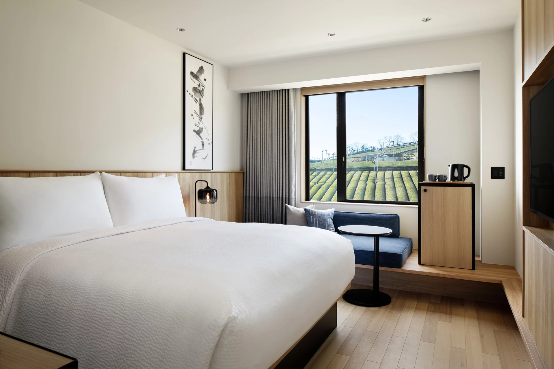 a room with a bed and a window