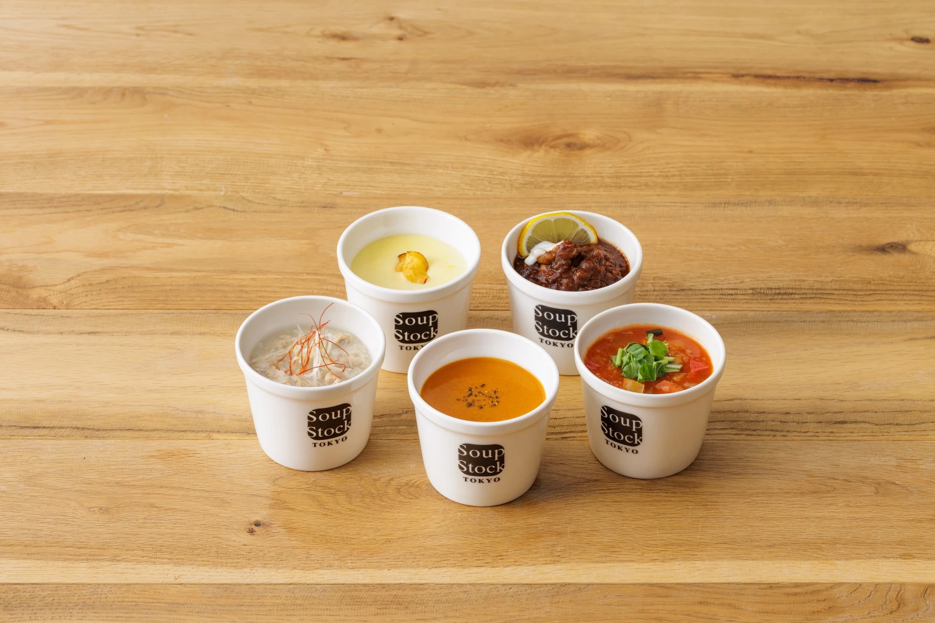 a group of cups of soup
