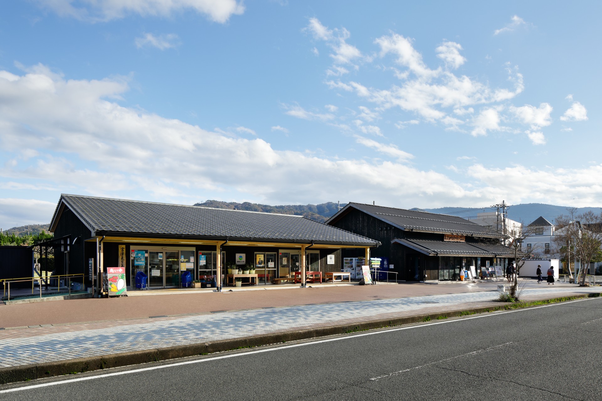 a building with many windows and a road