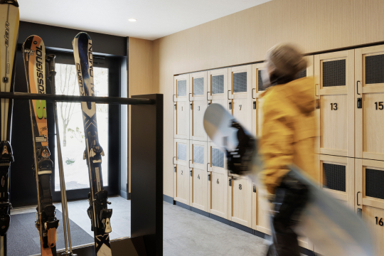 a person walking in a locker room