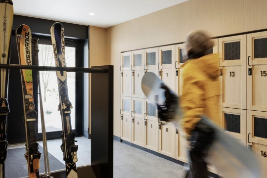 a person walking in a locker room