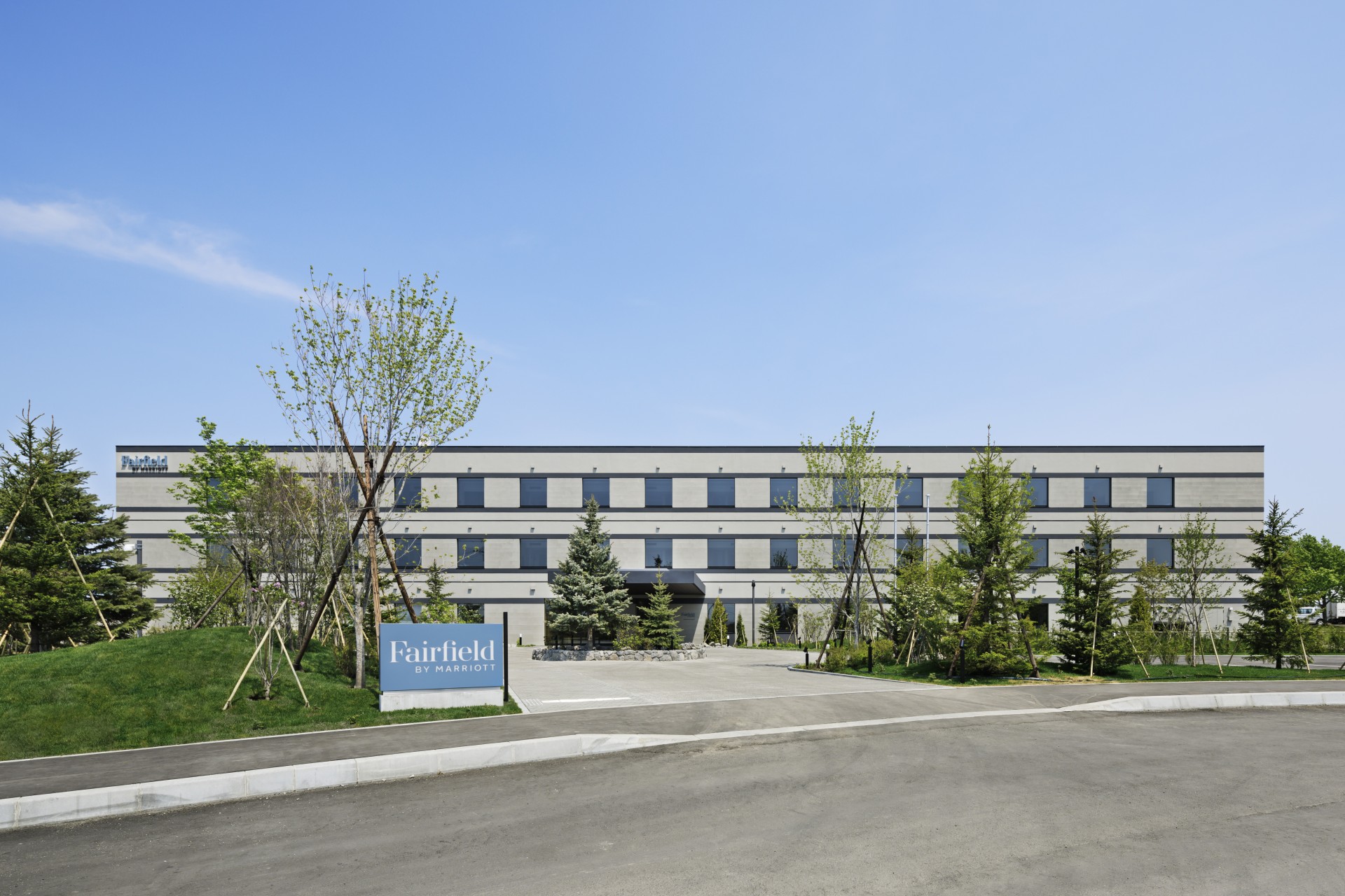 a building with trees in front of it