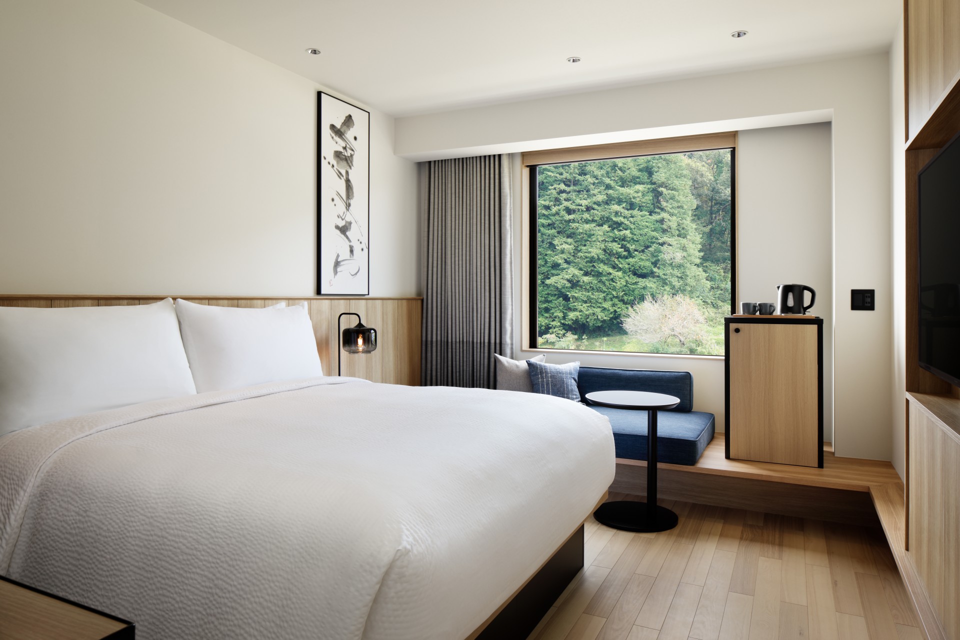 a room with a bed and a window