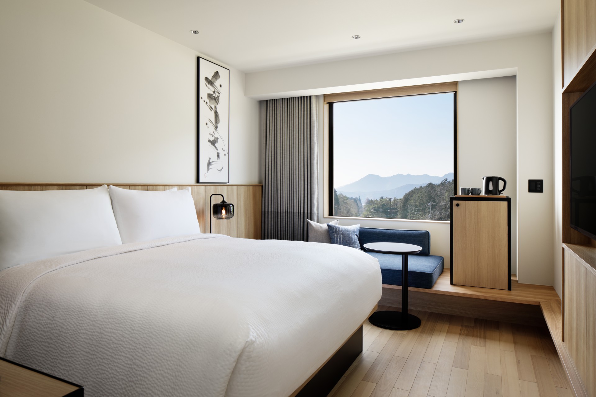 a room with a bed and a window