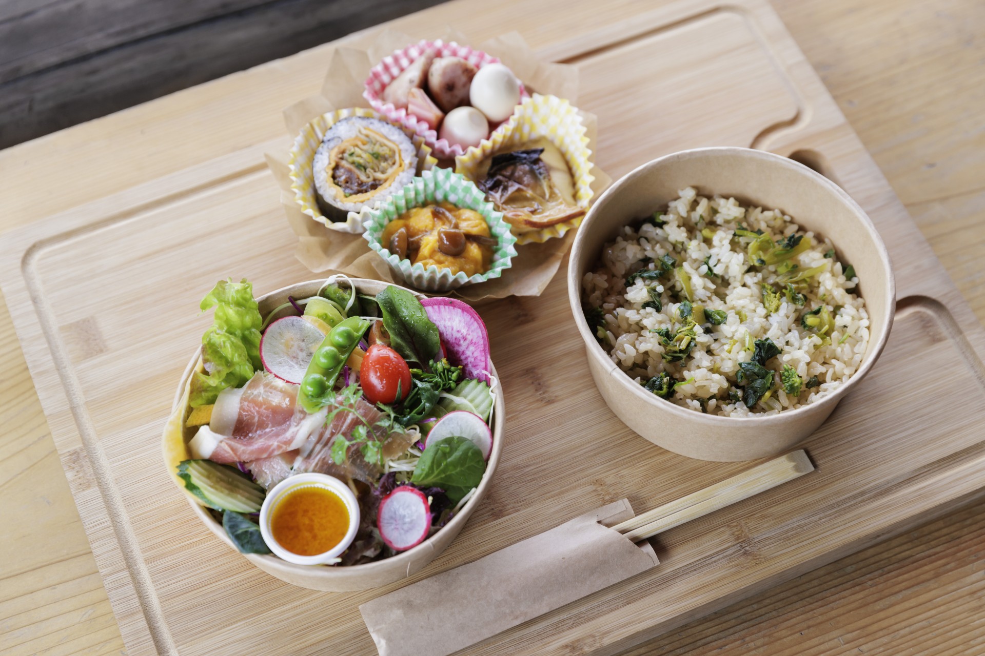 a bowl of food on a cutting board