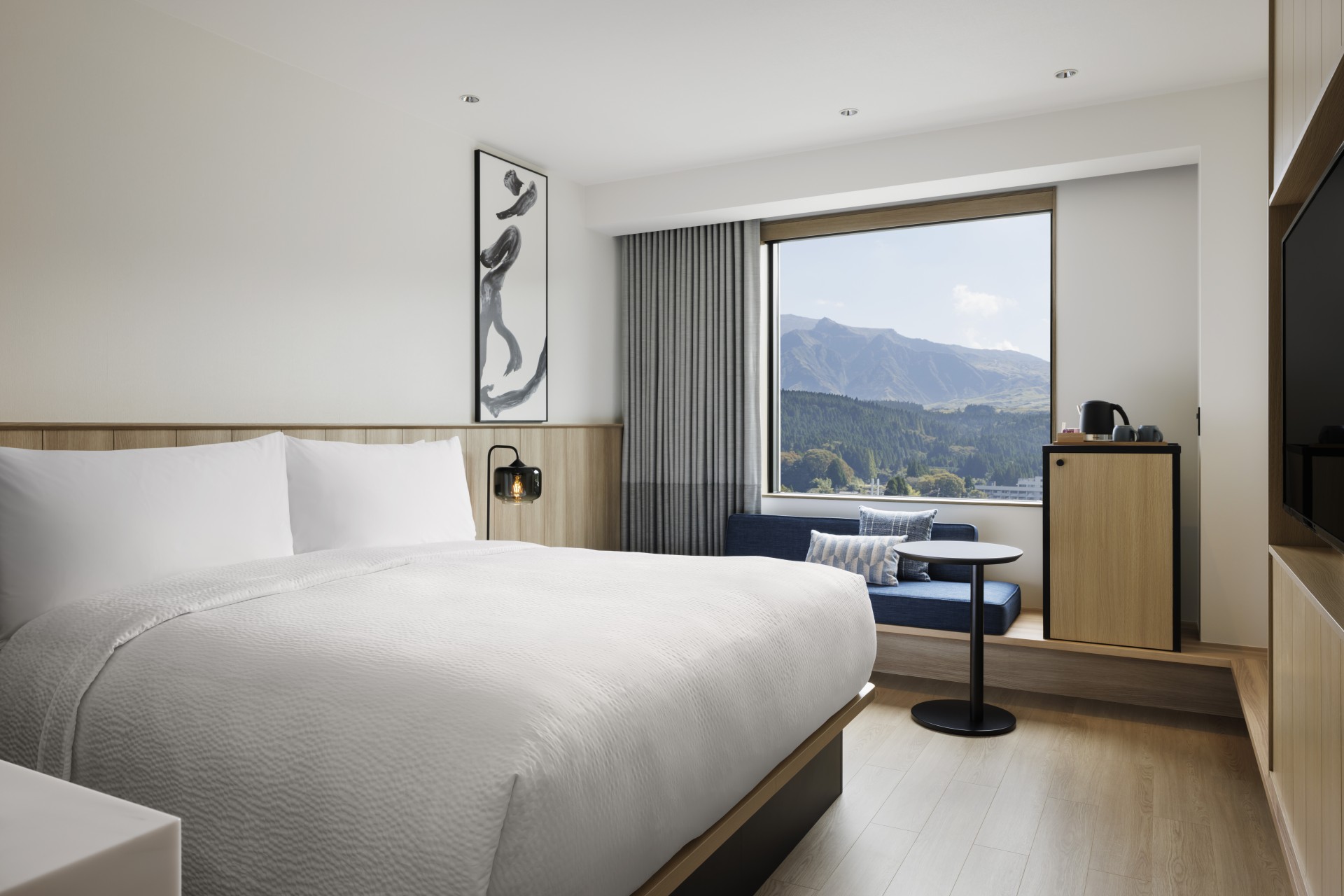 a room with a bed and a window