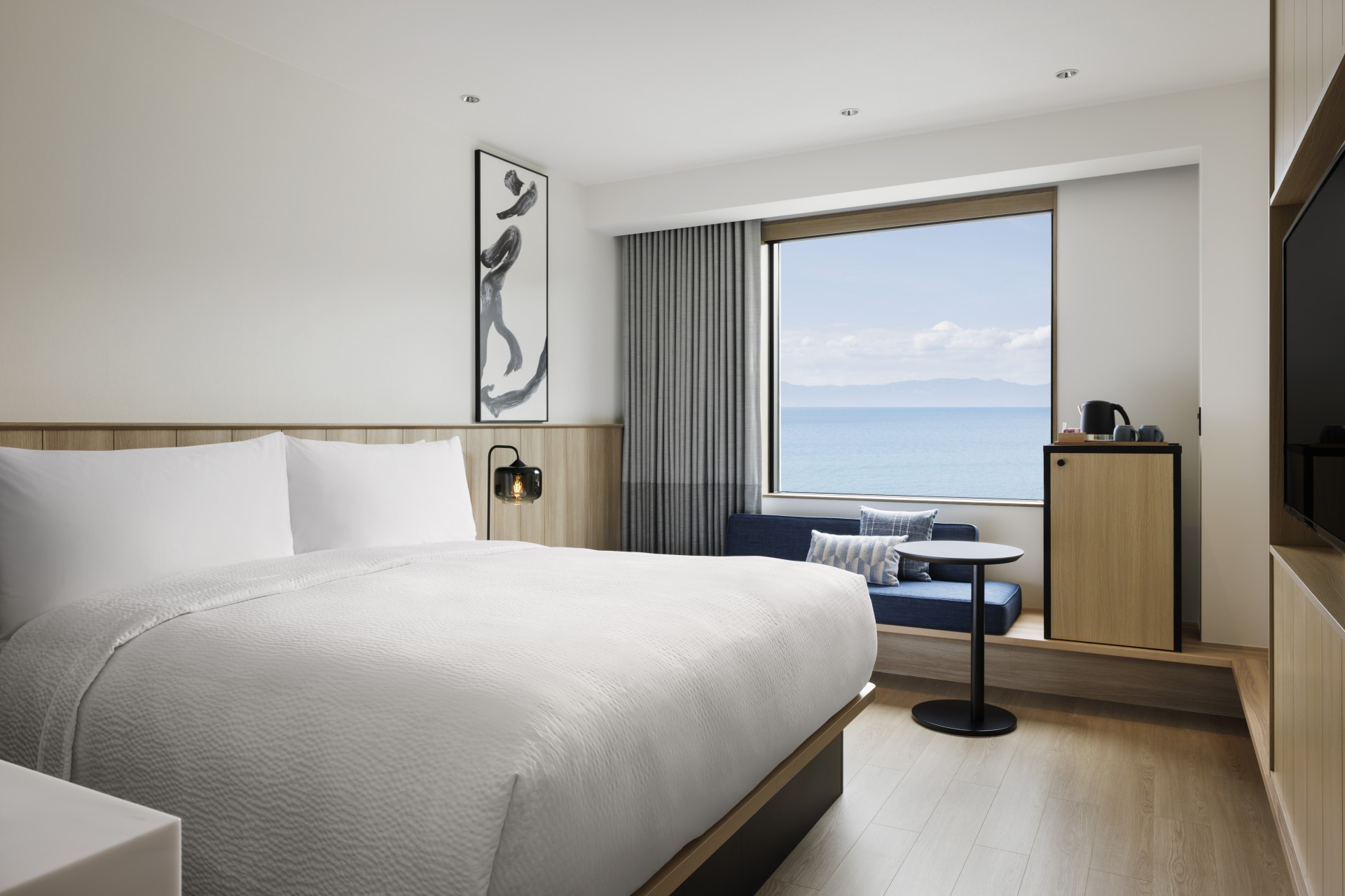 a room with a bed and a window