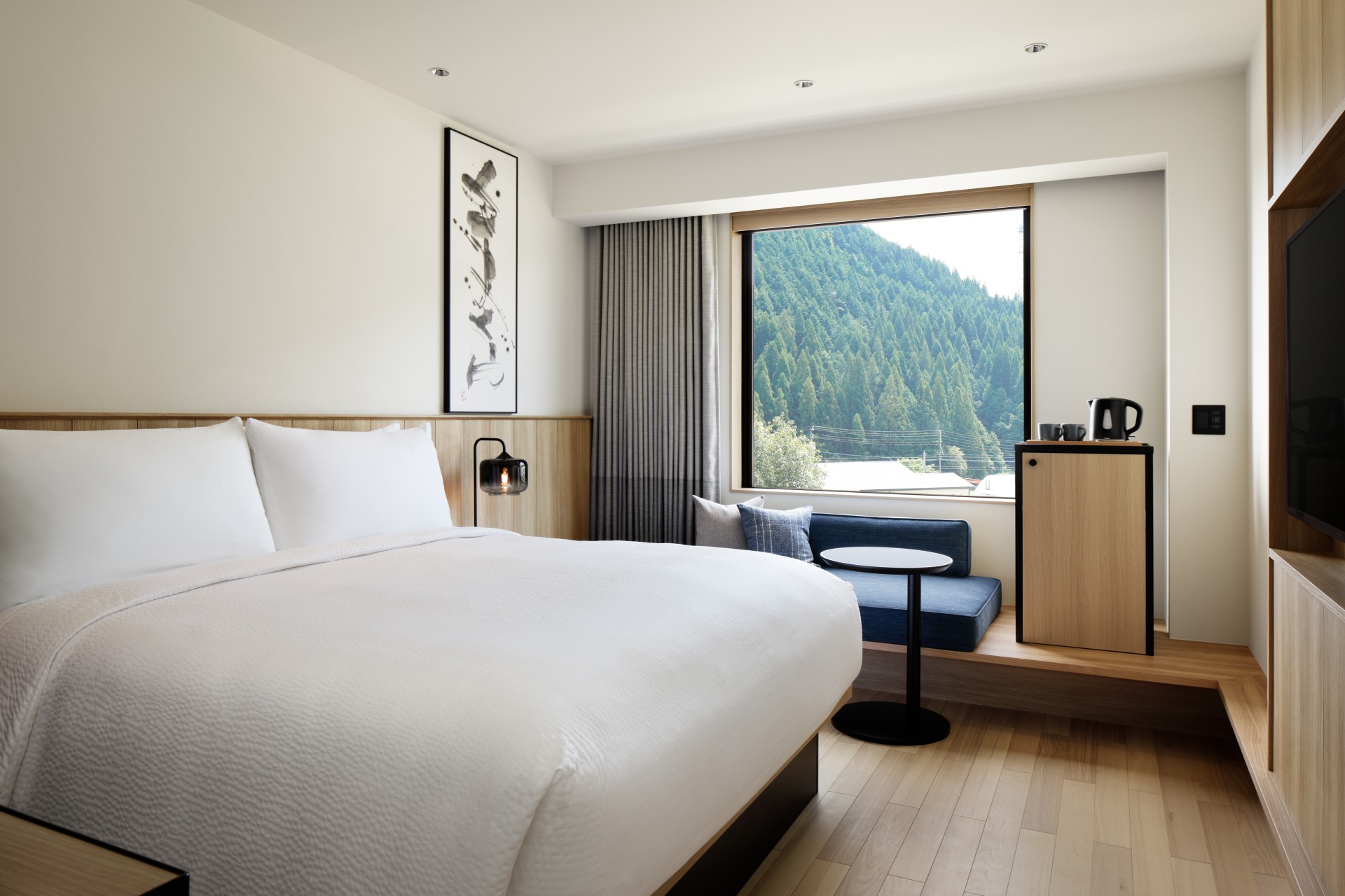 a room with a bed and a window