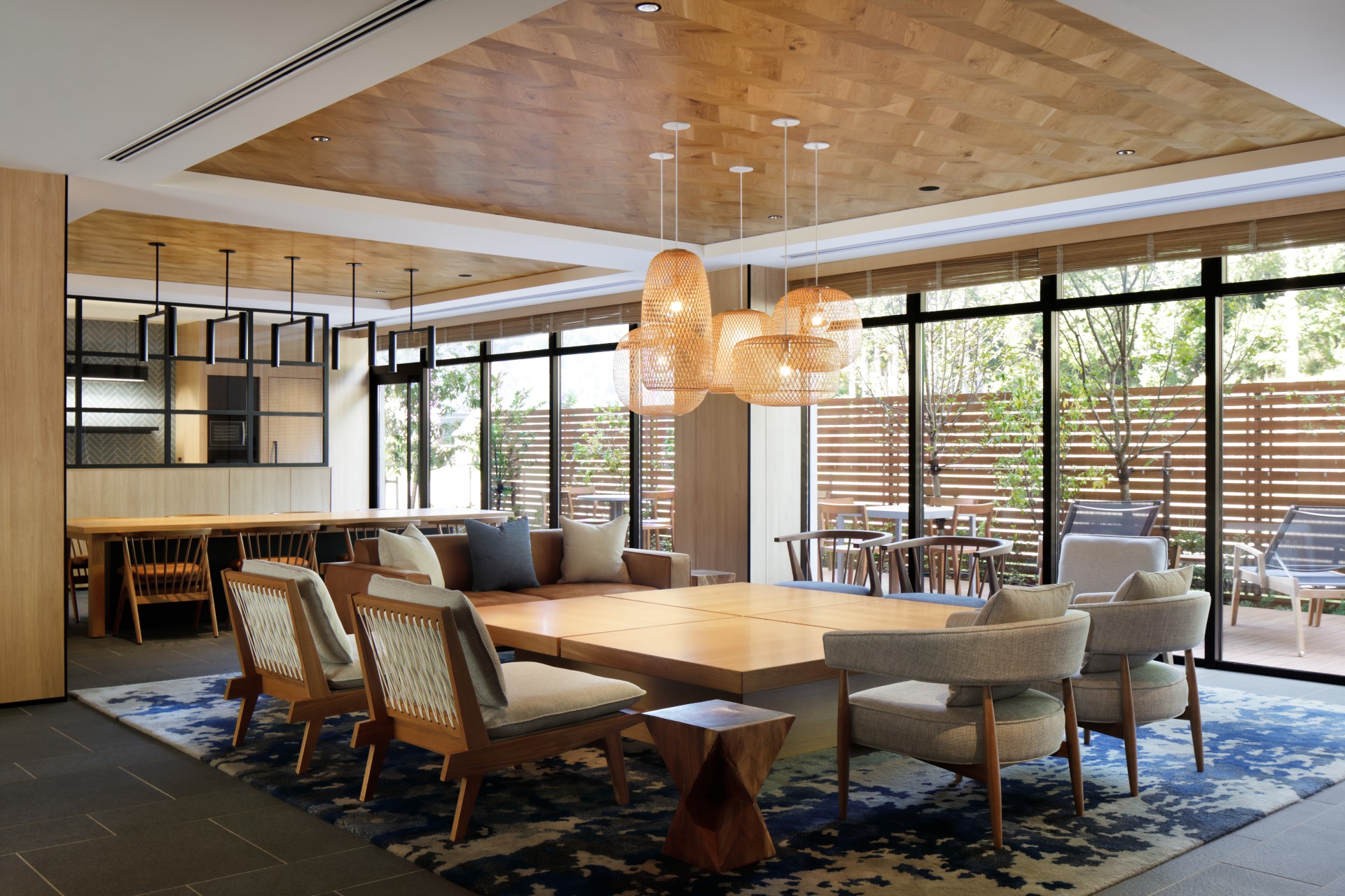 a room with a large table and chairs