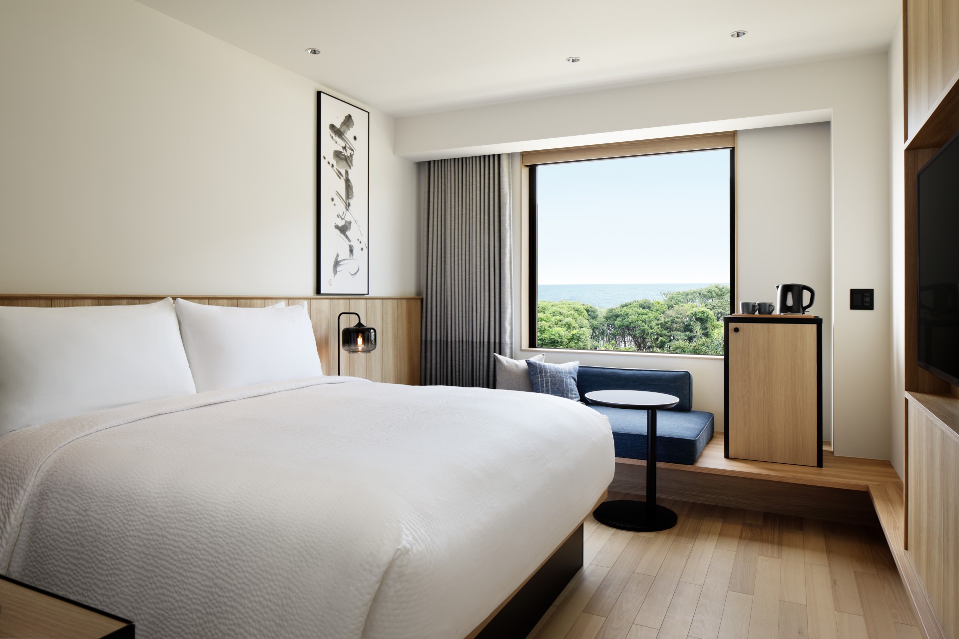 a room with a bed and a window