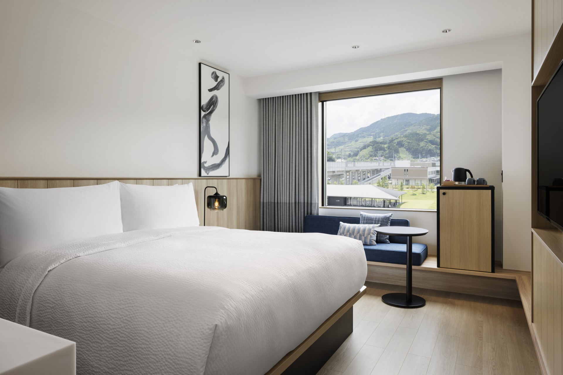 a room with a bed and a window