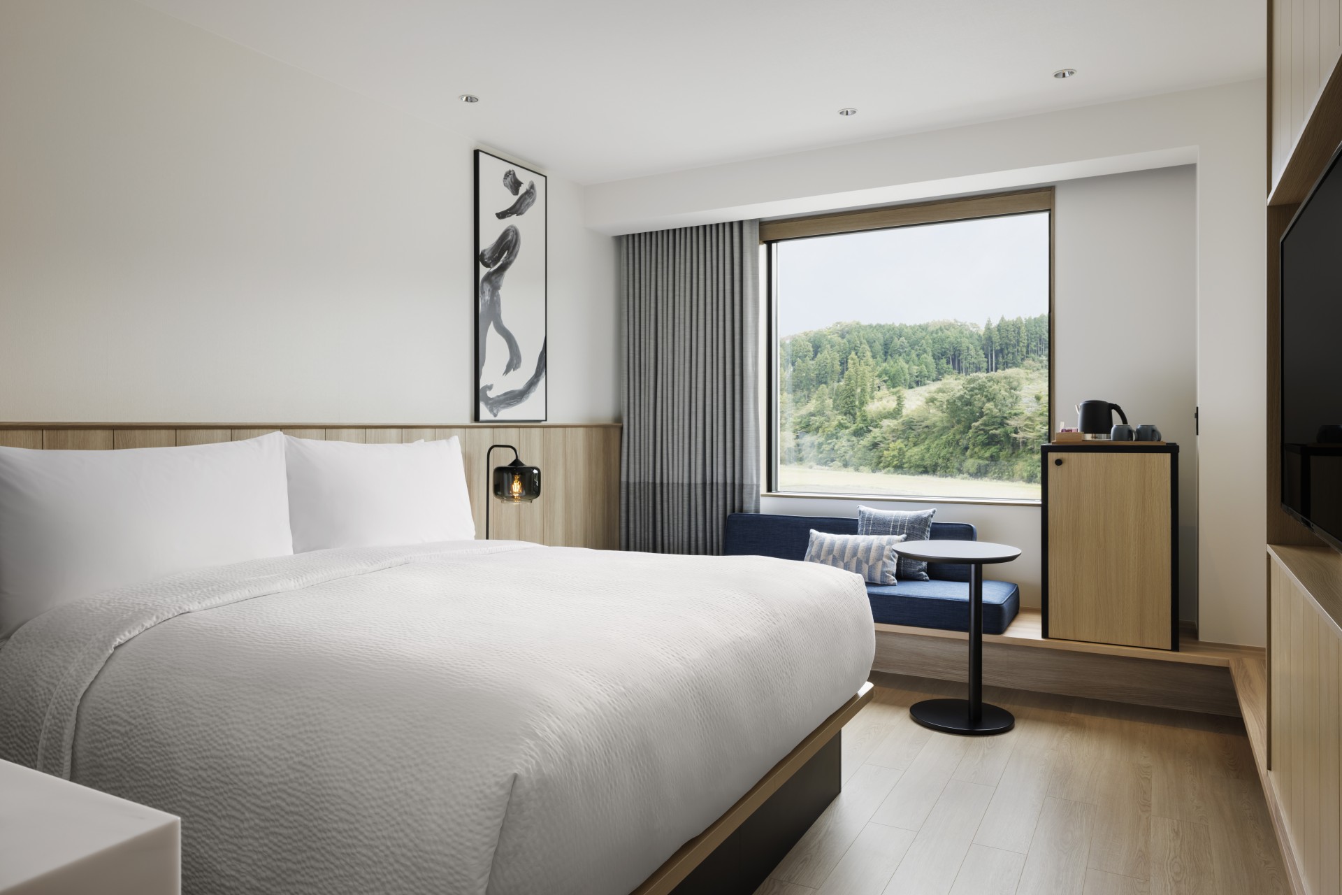 a room with a bed and a window