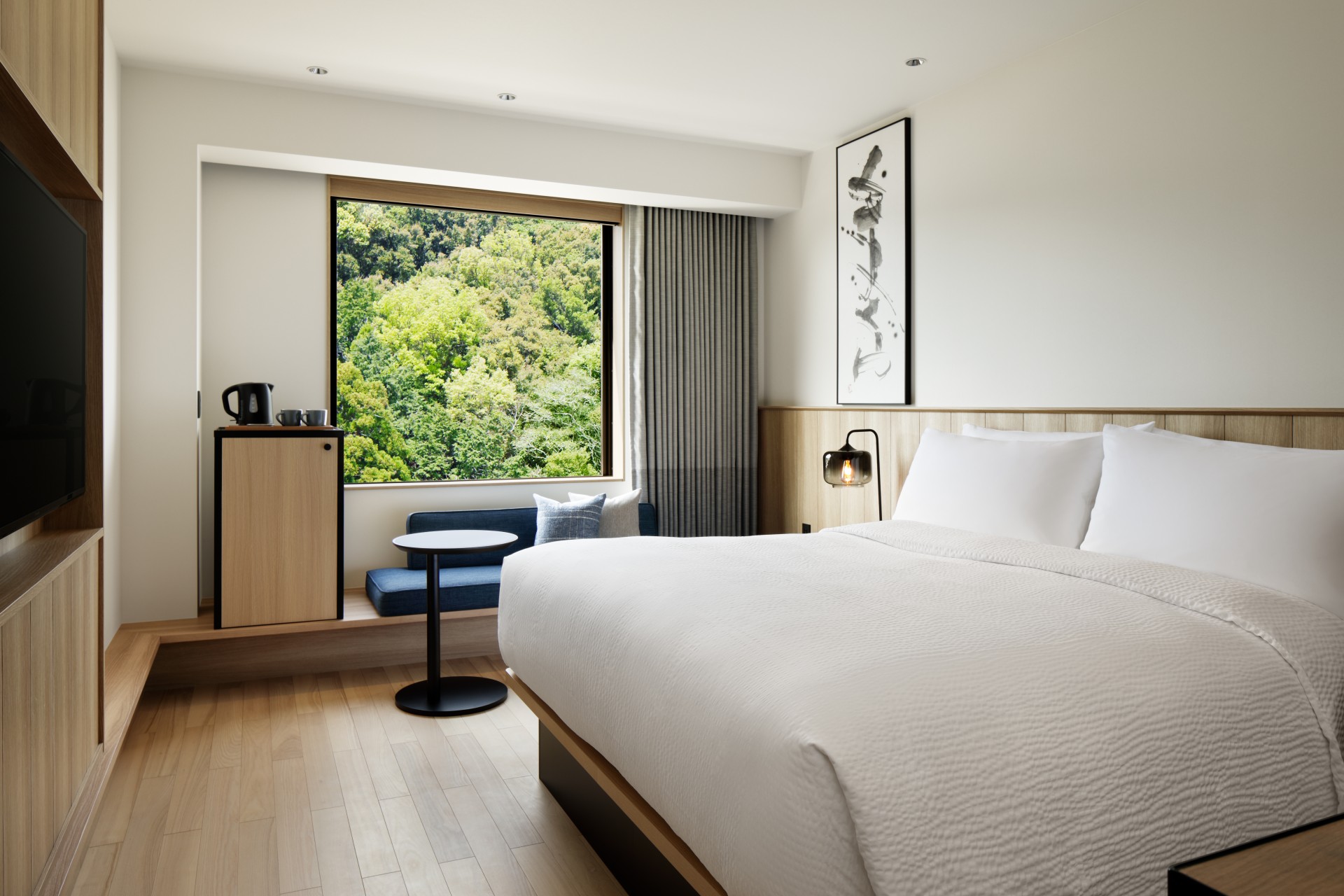 a room with a bed and a window
